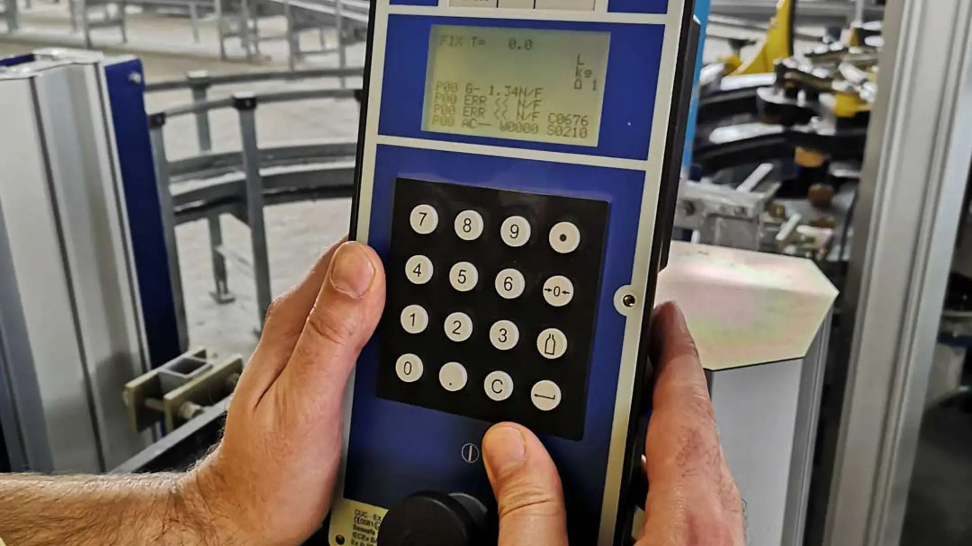 An image of hands holding a modern controller