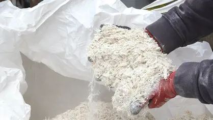 Shredded glass fibre in a big bag