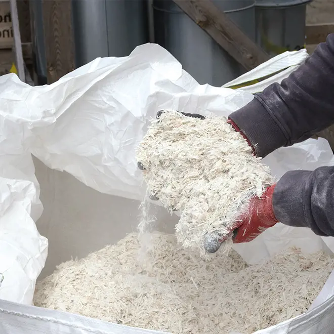 Shredded glass fibre in a big bag