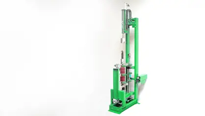 image of a green valve orientation machine