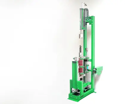 image of a green valve orientation machine