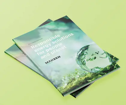 image of brochure cover with a glass globe laying in green grass, blue sky and a title saying Our energy approach