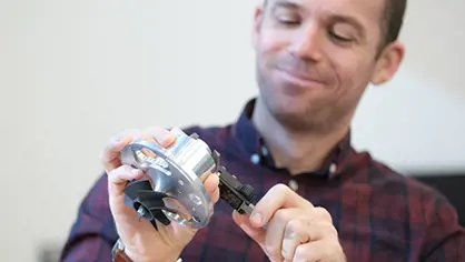 Engineering the energy of tomorrow Image of a engineering with a machine element