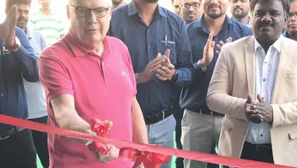 A red ribbon being cut at the inauguration ceremony of our new training centre