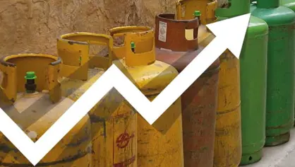 Upward pointing graph over a picture of worn LPG cylinders