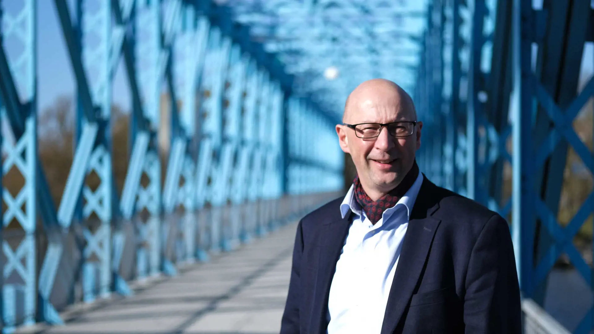Anders C. Anderson, CEO of MAKEEN Energy, standing on the blue bridge in Randers, Denmark