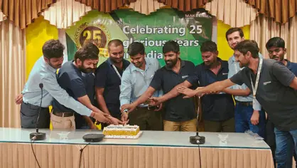 Picutre of 25 year anniversary celebration with cake