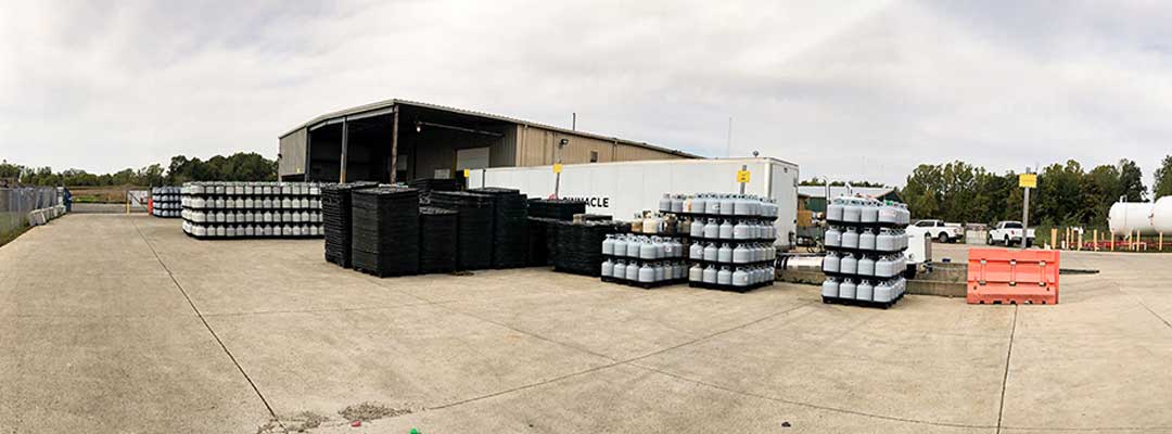 image of a loading place and several grey lpg cylinders