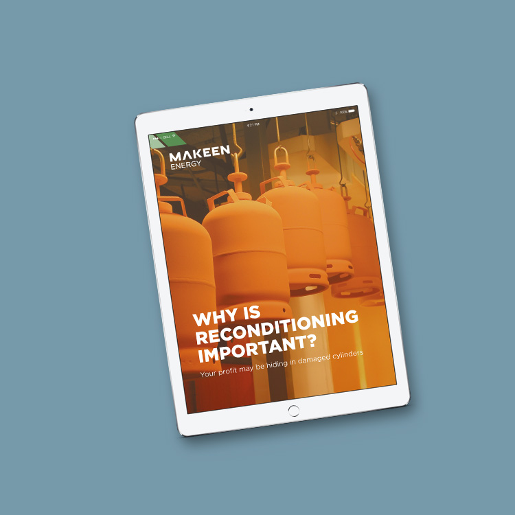 image of a tablet screen showing several orange LPG cylinders hanging in a hook down from the ceiling