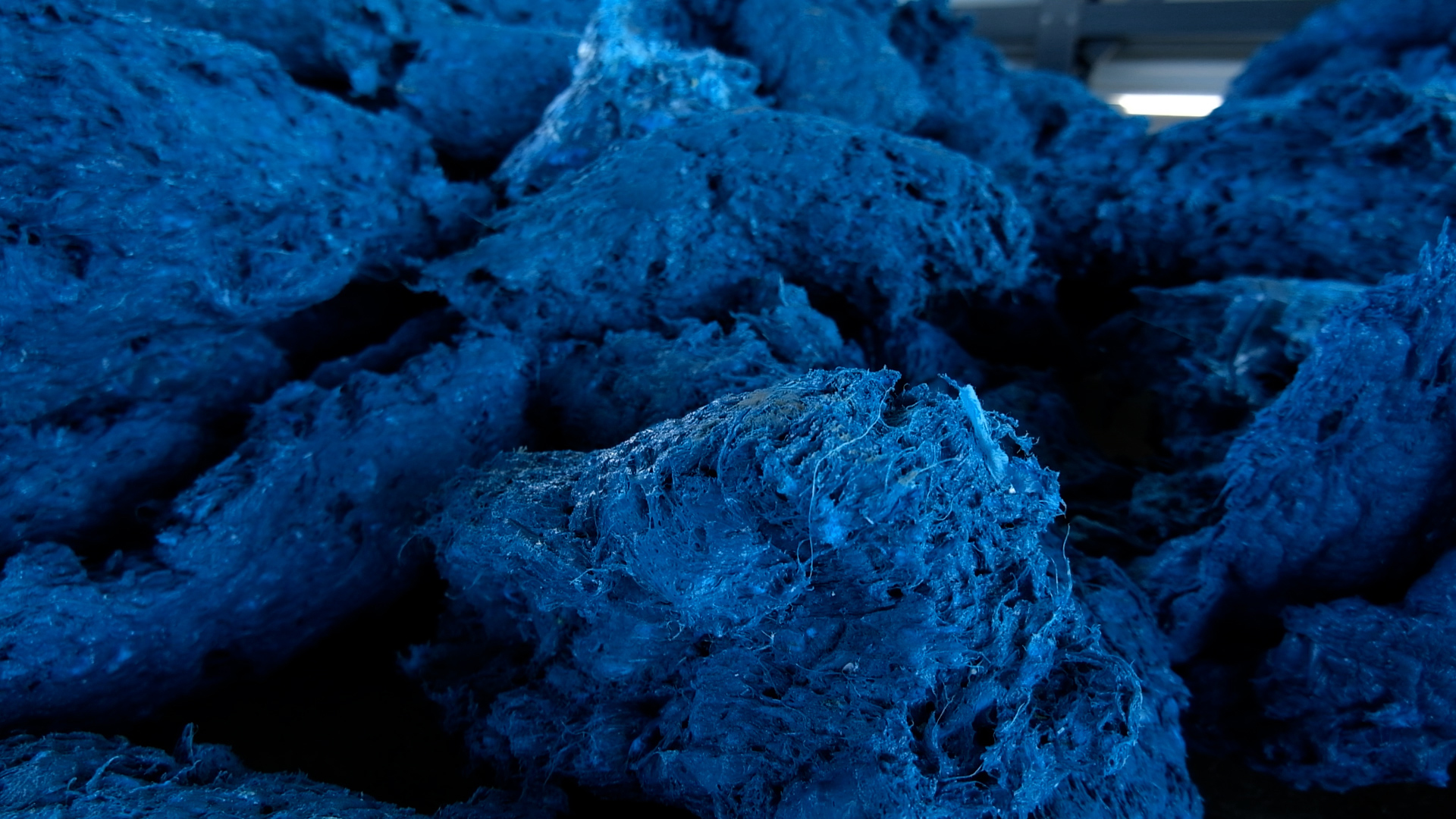 closeup of densified blue plastic