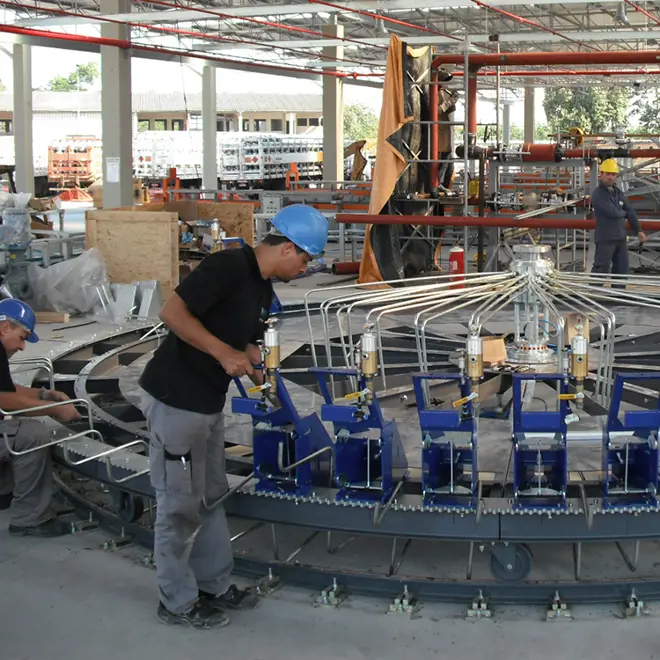 image of a FLEXSPEED carrousel being installed by a worker