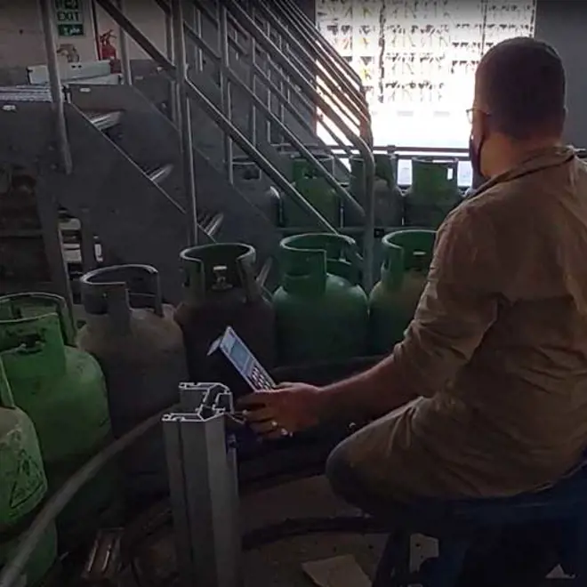 An image of a man sitting in front of a Flexspeed